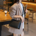 Sac bandoulière spacieux en cuir véritable