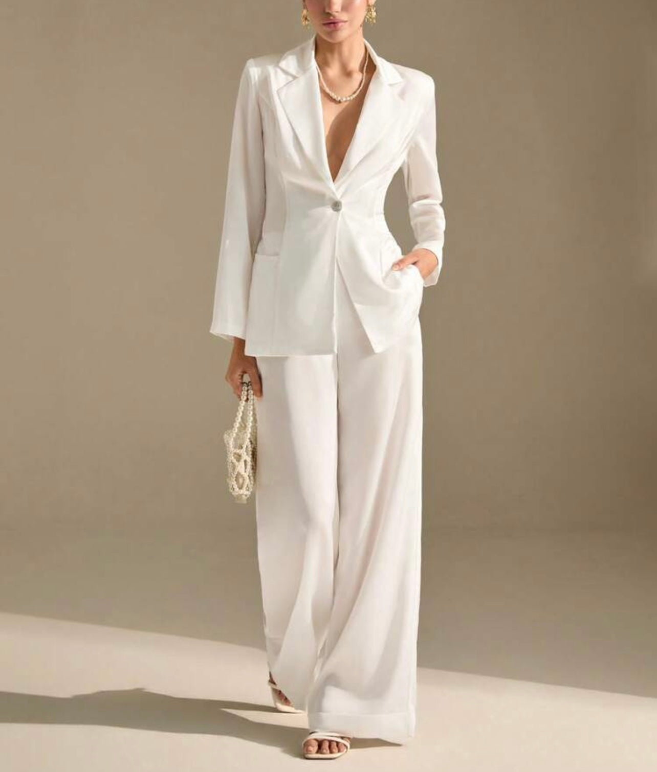 Completo giacca e pantalone a gamba ampia
