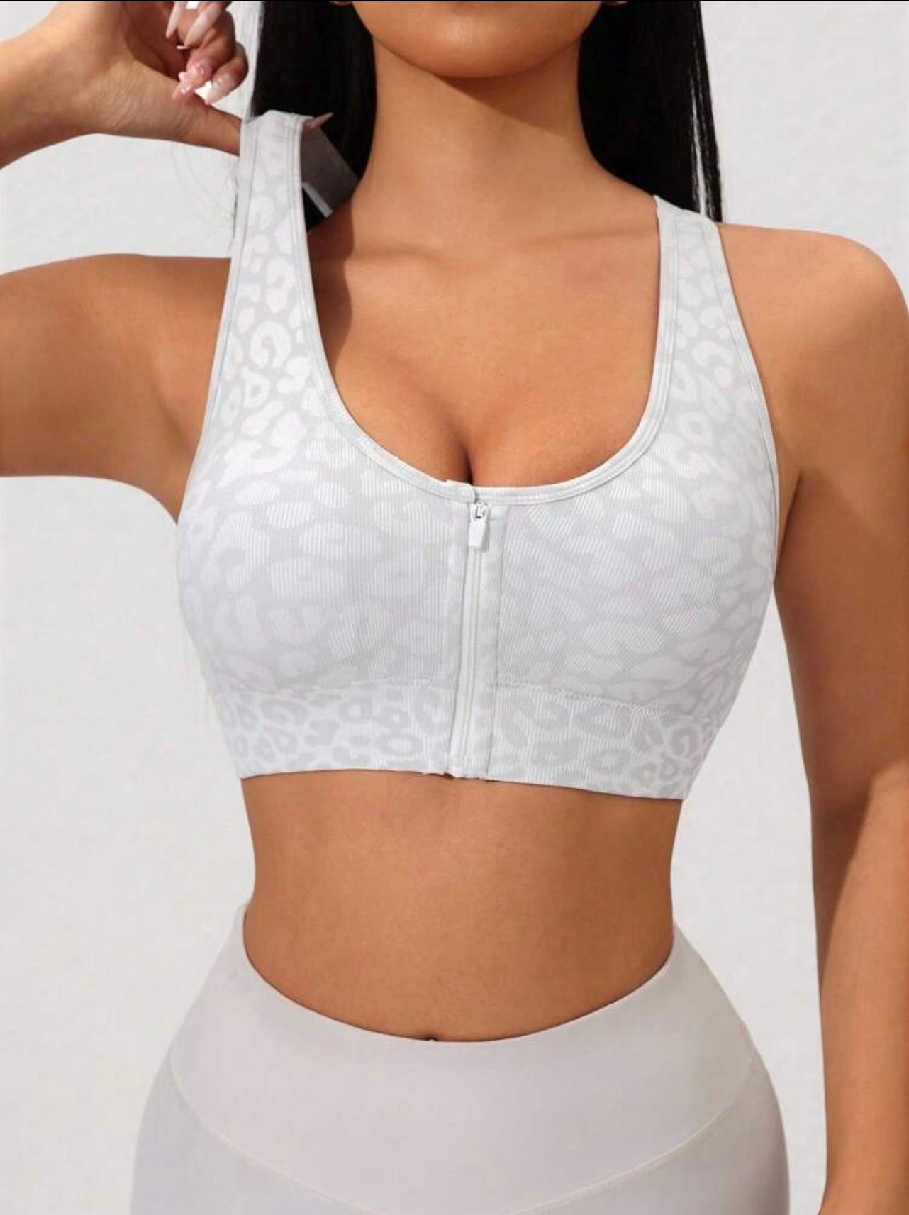 Reggiseno sportivo da donna con stampa leopardata e zip frontale