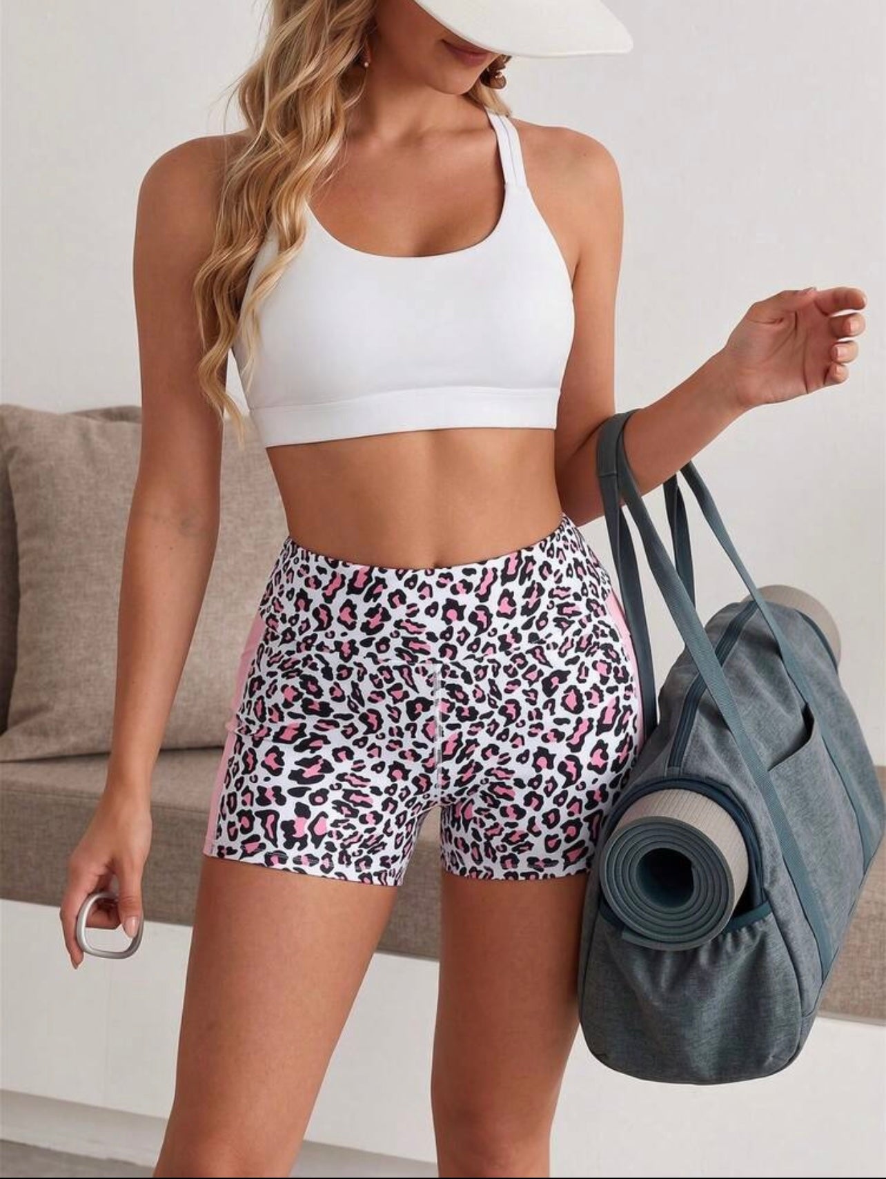 Pantaloncini aderenti in vita alta con stampa leopardata e tasche