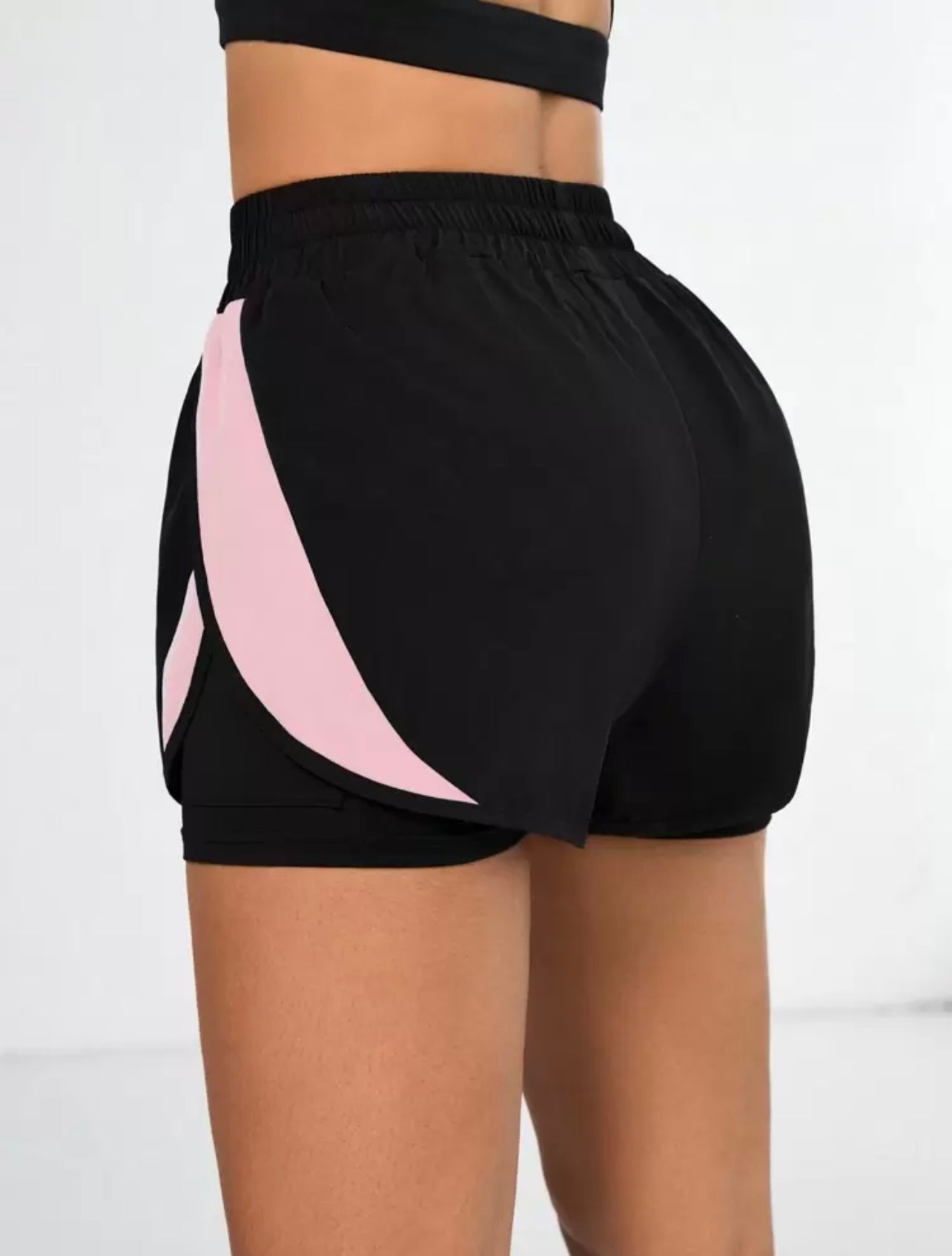 Pantaloncini sportivi  da donna con colore a contrasto e tasche