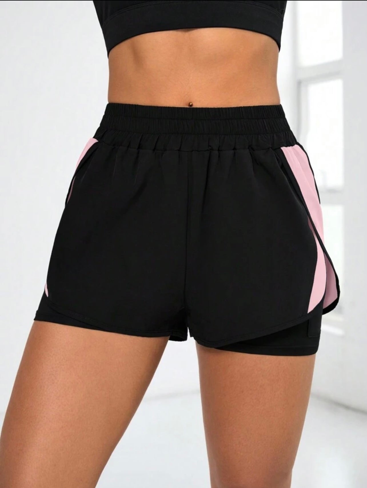 Pantaloncini sportivi  da donna con colore a contrasto e tasche