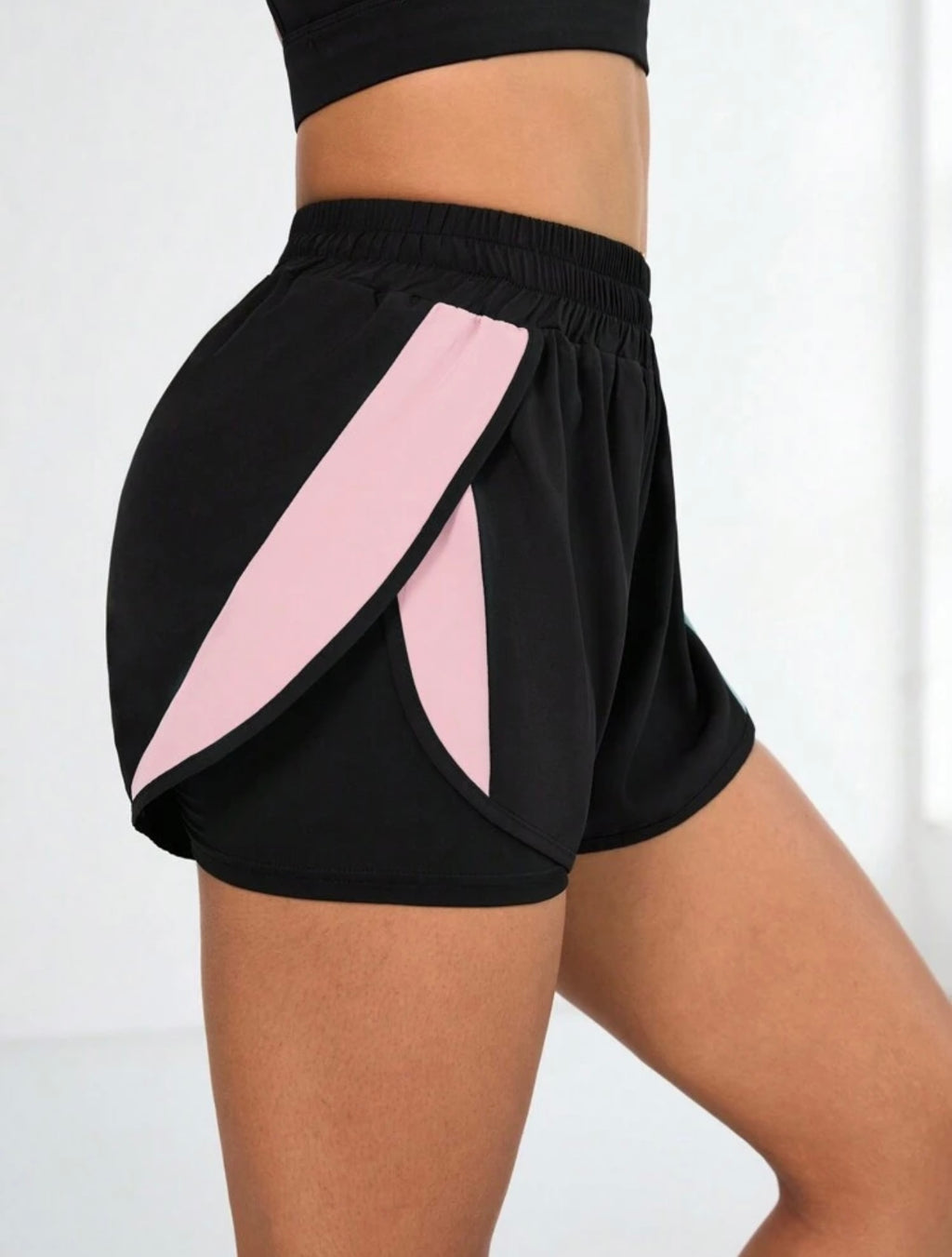 Pantaloncini sportivi  da donna con colore a contrasto e tasche