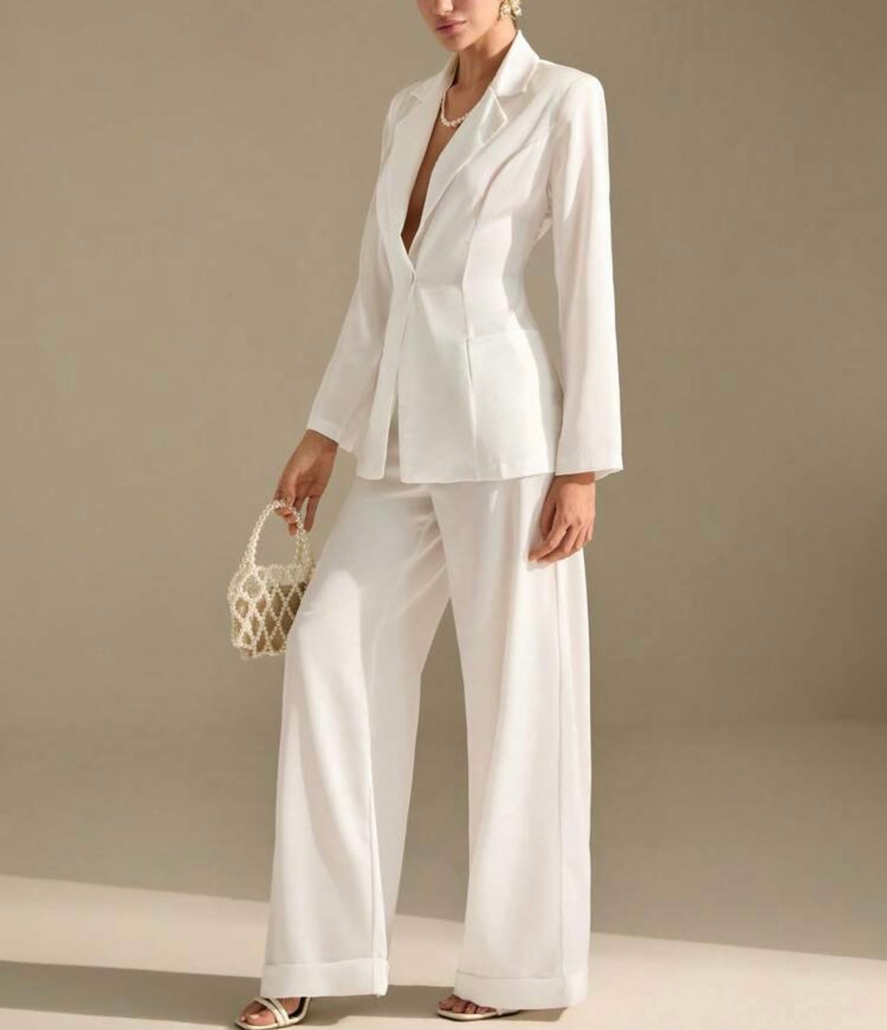 Completo giacca e pantalone a gamba ampia