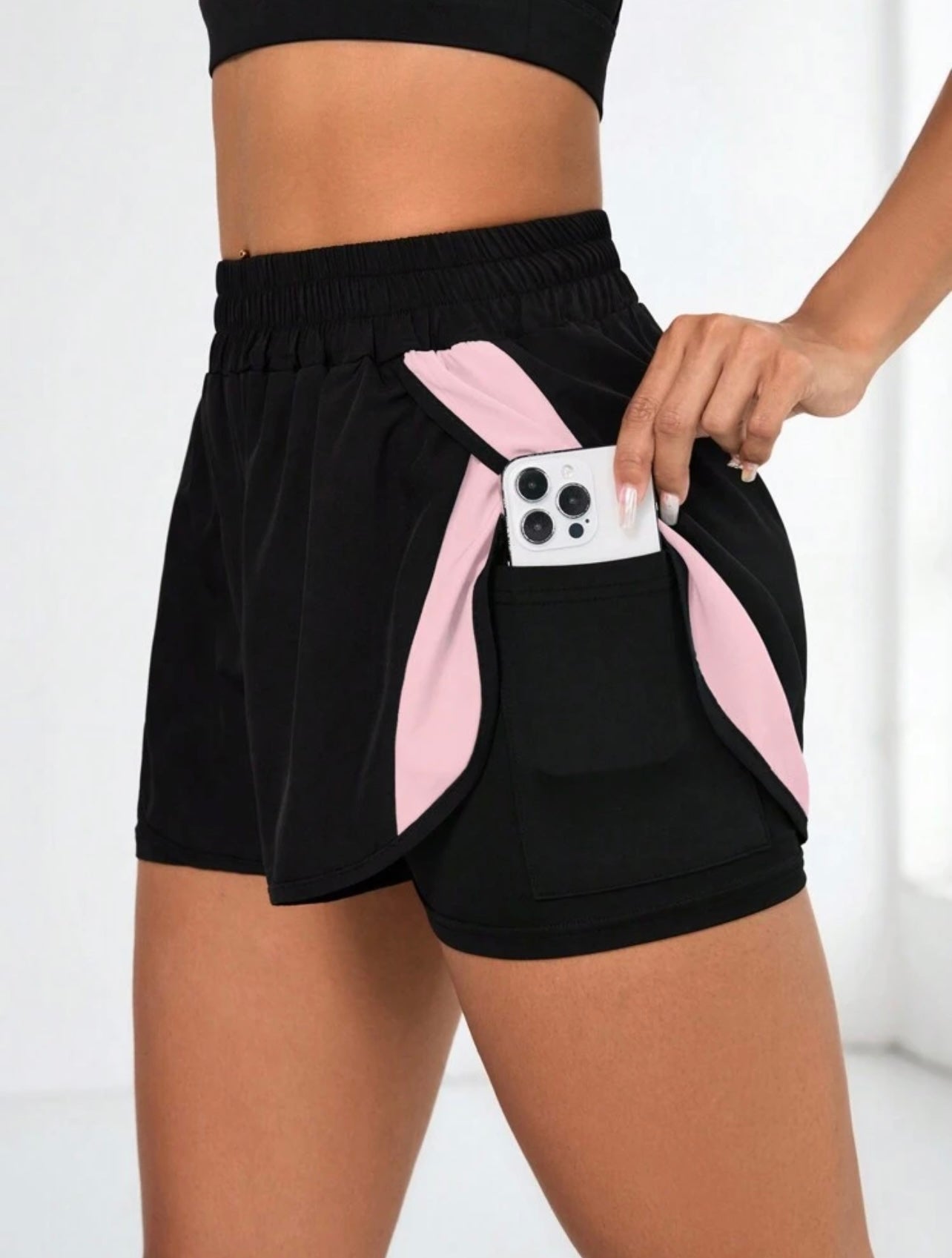 Pantaloncini sportivi  da donna con colore a contrasto e tasche