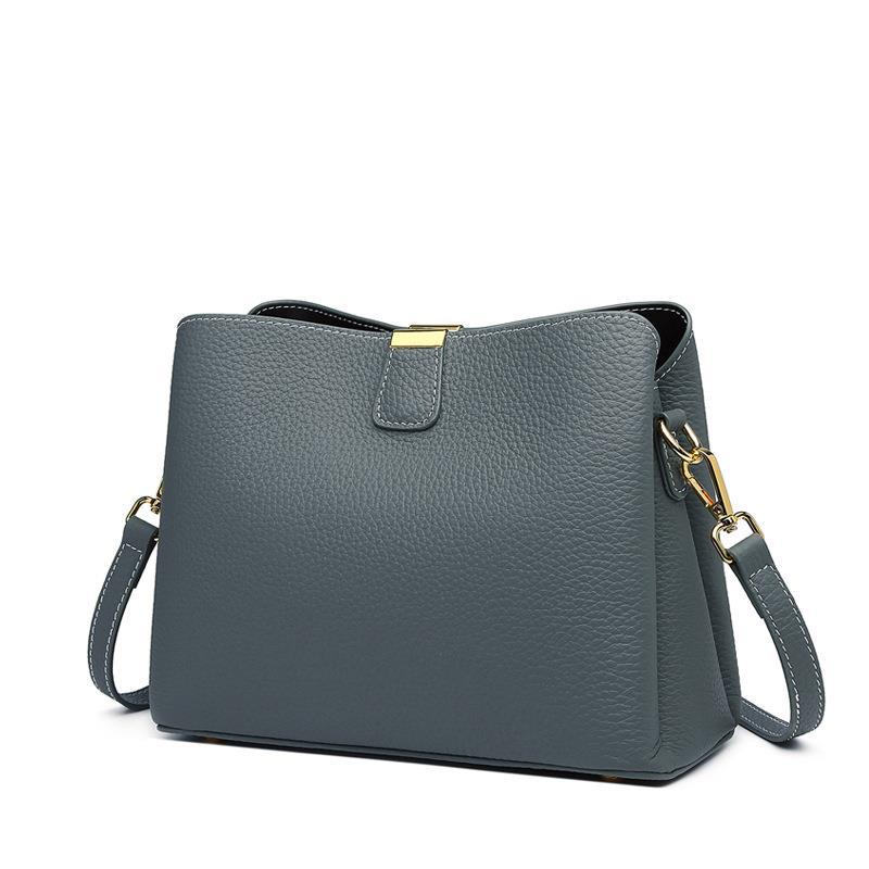 Sac bandoulière spacieux en cuir véritable